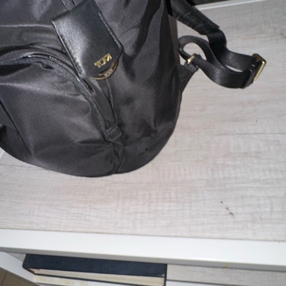 Tumi Black Backpack with Gold Accents - Picture 13 of 13